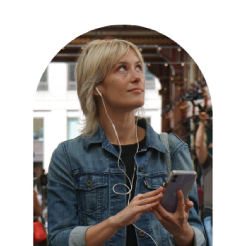 Woman listening to audio guide