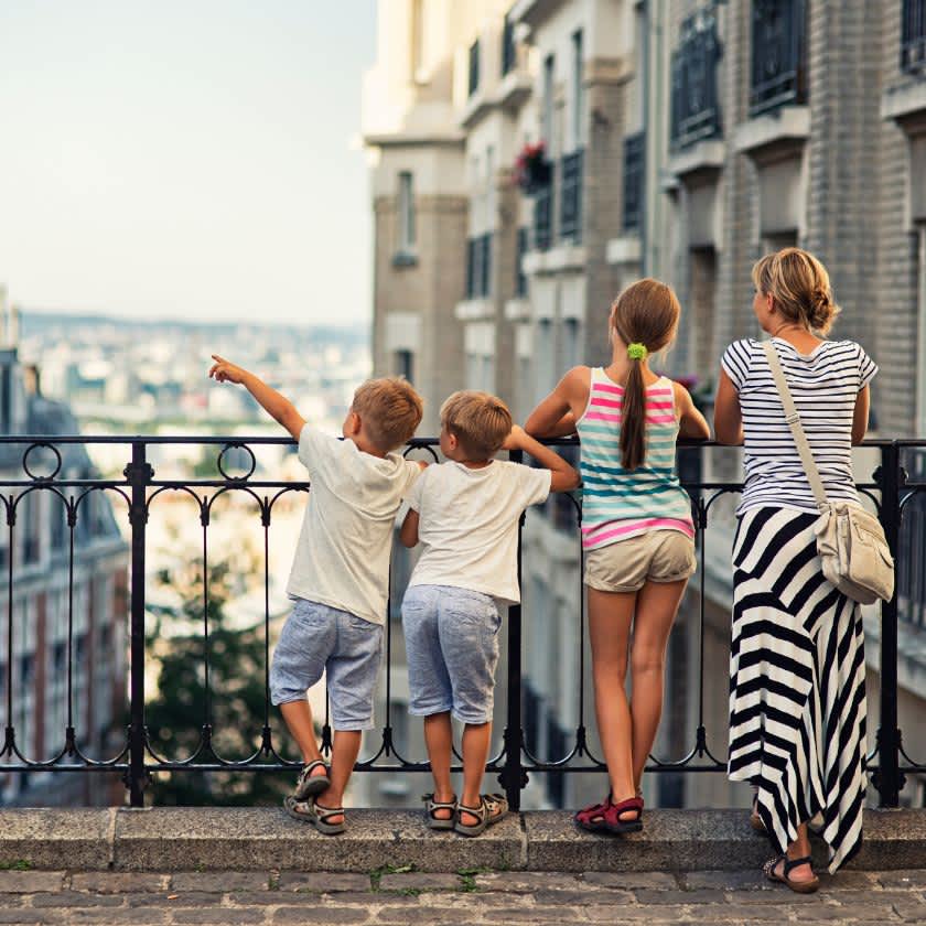 Family in Paris overlooking city