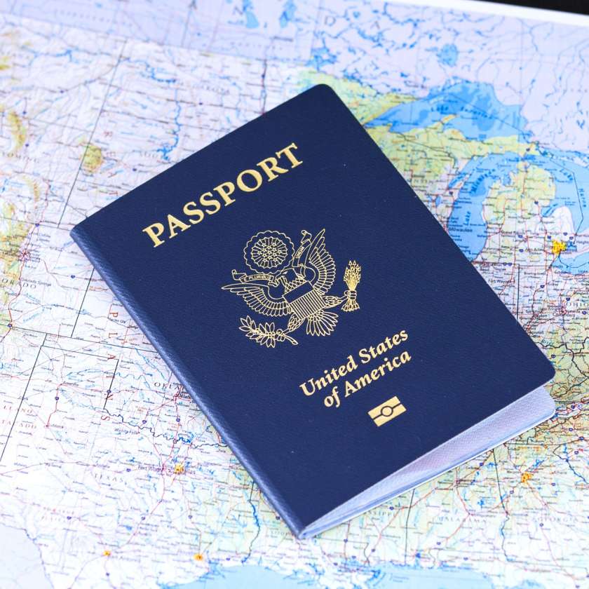 image of a united states passport lying on a map