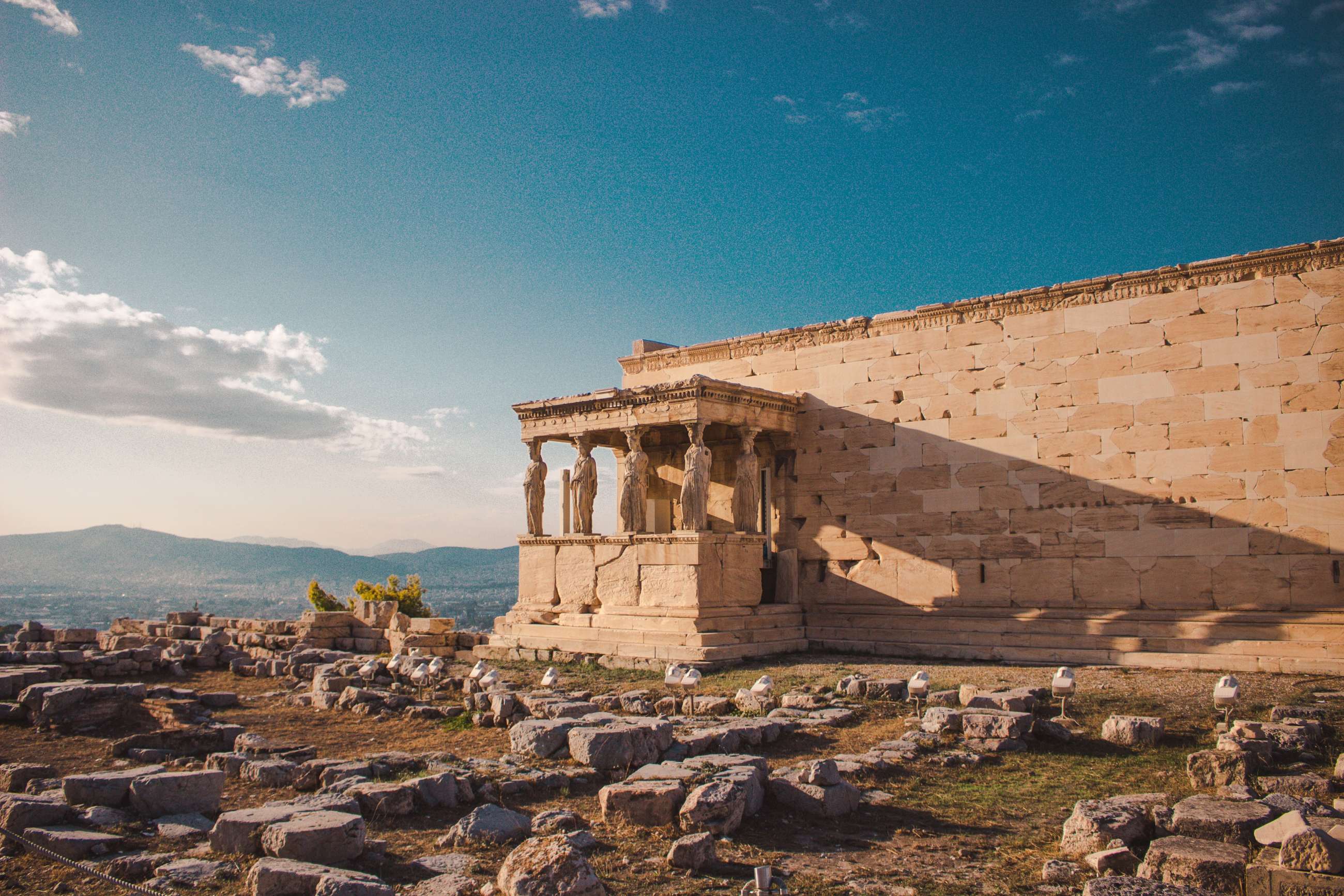 view of the Acropolis in Athens at sunset