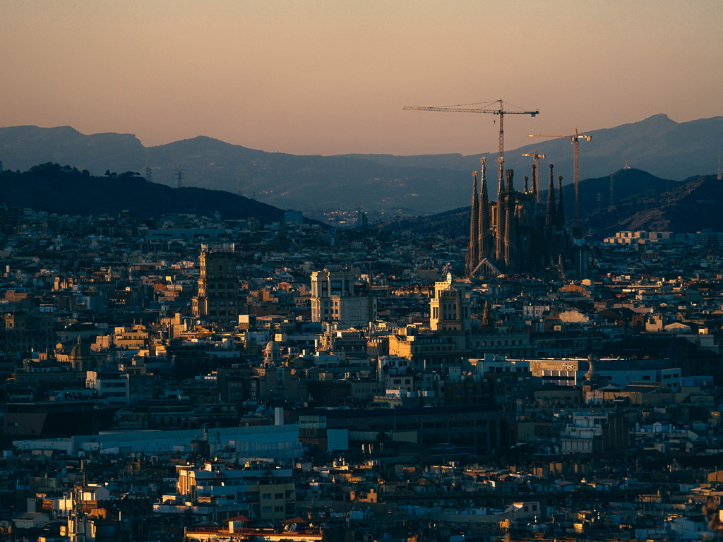 La Sagrada Familia, with its ever-present cranes, looming over the Barcelona skyline