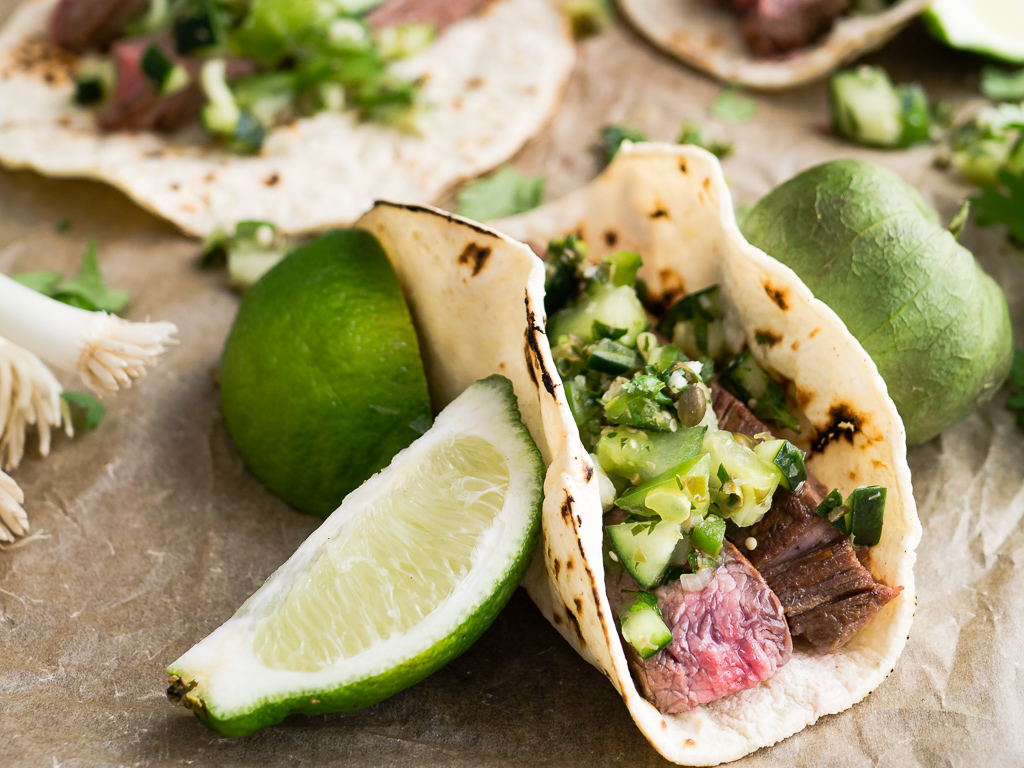 Mexican steak tacos, with lime and avocado