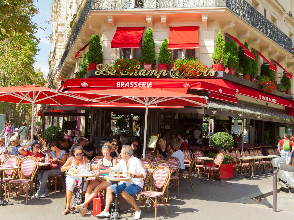 Families enjoying a meal at a French restaurant