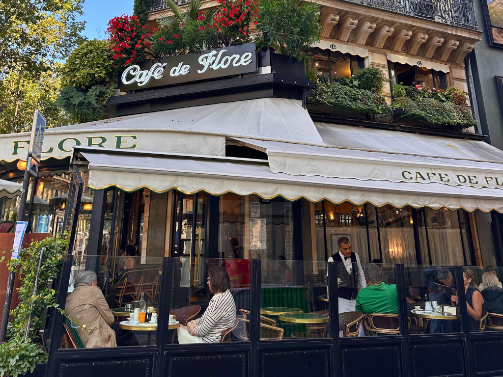 Guests eating at Cafe de Flore in Paris, 