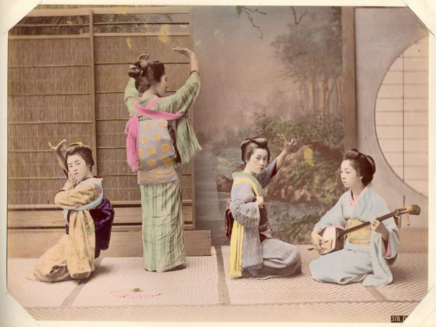Four geisha in dance poses
